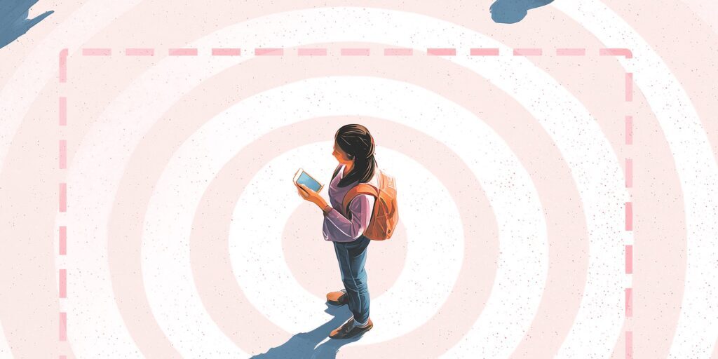 A birds-eye view of a person looking at a smartphone, with rings radiating from where they're standing. A dashed line frames the person—symbolizing geofencing.