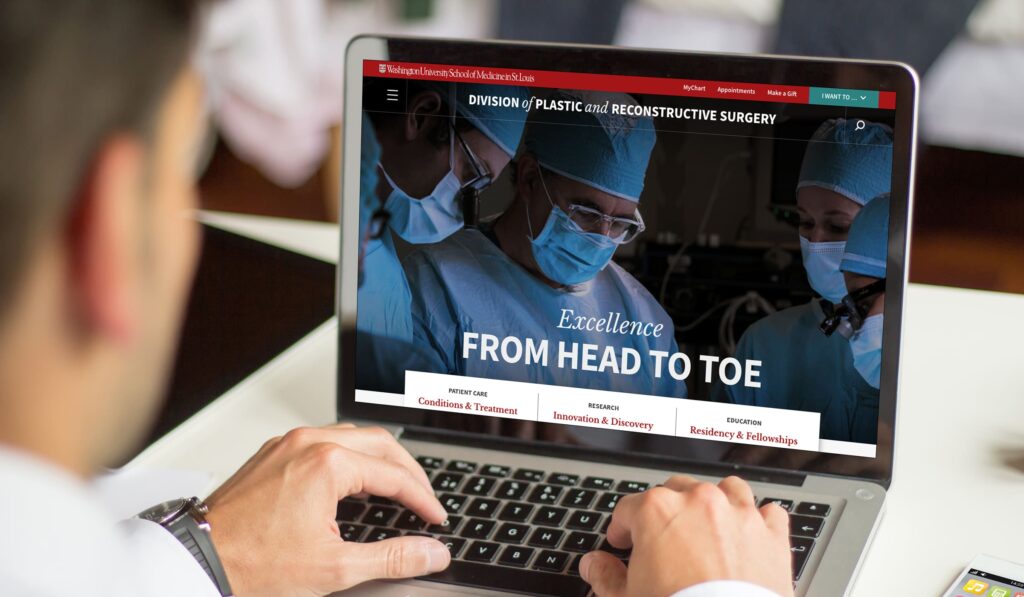 Redesigned WashU Plastic Surgery website homepage displayed on laptop screen.